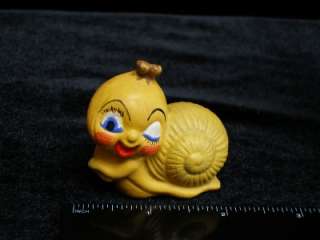 Cute winking snail vintage figurine, unmarked. There are no chips 