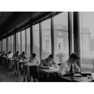 Students Studying at a Library at Harvard University 