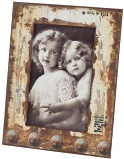 This set of 6 distressed metal photo frames make a beautiful addition 