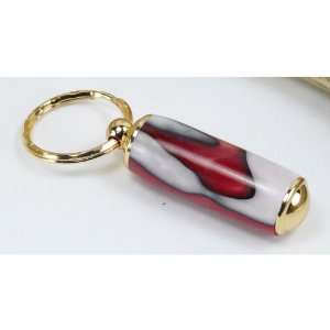  Ruby Red Swirl Acrylic Pill Case With a Gold Finish 