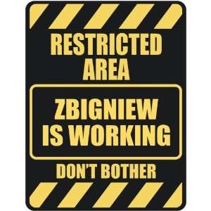   RESTRICTED AREA ZBIGNIEW IS WORKING  PARKING SIGN