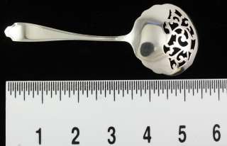 This spoon measures 5 5/8 inches long.