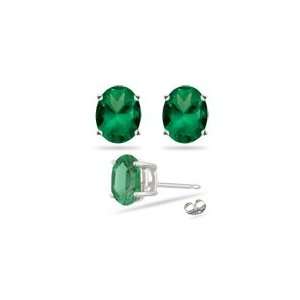  0.75 0.97 Cts of 6x4 mm AA Oval Emerald Stud Earrings in 