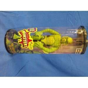   Universal Studios Monsters in Clear Plastic Display Tube Toys & Games