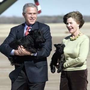  President Bush and First Lady, Laura, Carry Their Dogs 
